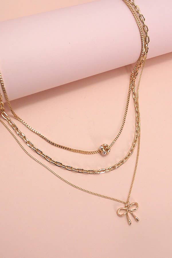 Layered Pearl Necklace with Bow Charm