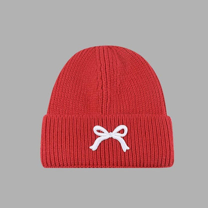 SOFT RIBBED KNIT BOW ACCENT BEANIES HAT