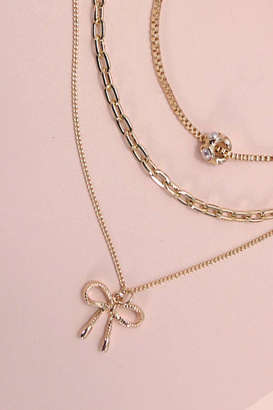 Layered Pearl Necklace with Bow Charm