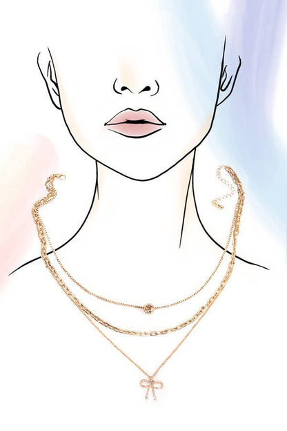 Layered Pearl Necklace with Bow Charm