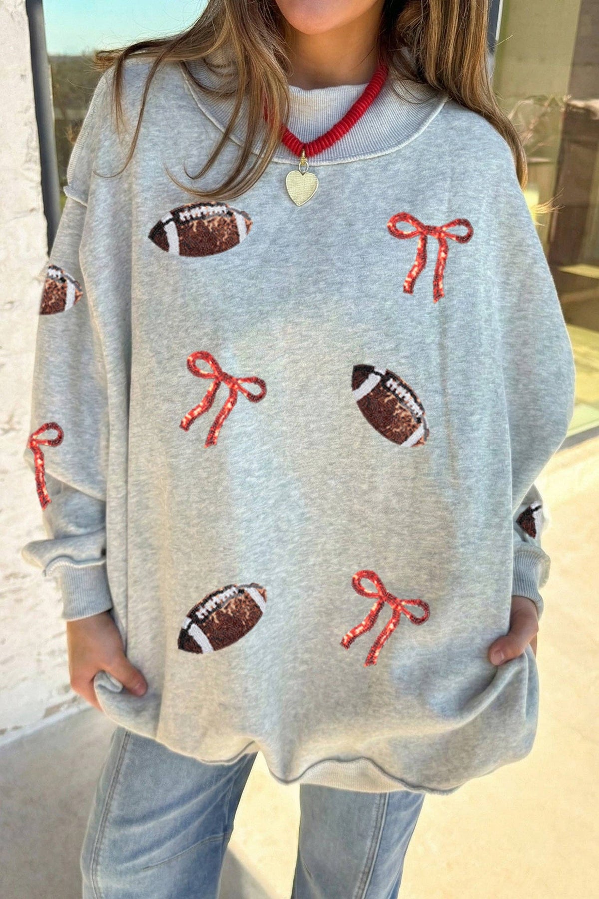 Sequin Bow Rugby Mock Neck Sweatshirt